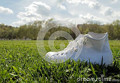 Sneakers in the grass Stock Photo