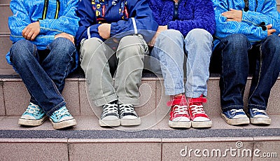 Sneakers on a kids feet Stock Photo