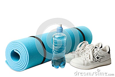 Sneakers, water and gymnastic carpet Stock Photo