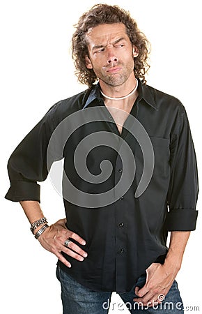 Sneering Man in Black Shirt Stock Photo