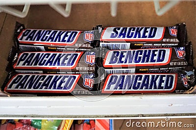 Snickers candybars with specialty NFL term wrappers Editorial Stock Photo