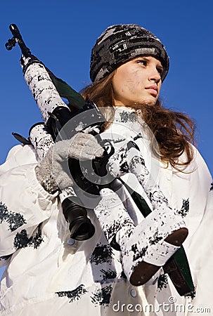 Sniper girl in white camouflage Stock Photo