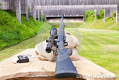 Sniper rifle on gun range Stock Photo