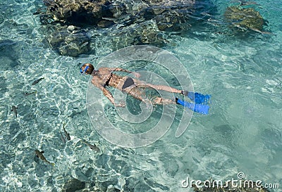 Snorkeling in a tropical lagoon - Bora Bora Stock Photo