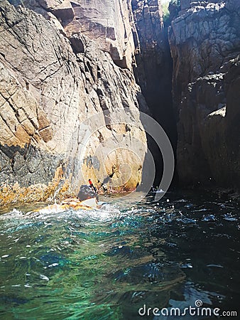 Snorkelling tourist at the caves of the Pulau Pinang on the island of Redang. Editorial Stock Photo