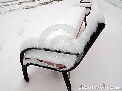 Snow on benches - winter Stock Photo