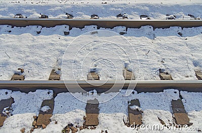 Snow-Blanketed Railway Tracks in Dugo Selo, Croatia Stock Photo