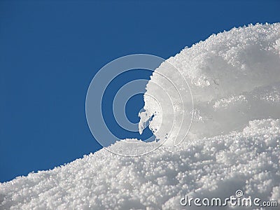 Snow And Blue Sky Stock Photo