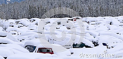 Snow buried cars after blizzard on car park Stock Photo