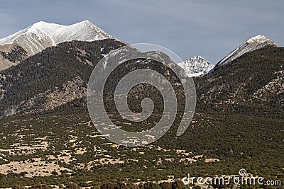 Snow Capped 13,580 Foot Twin Peaks and 14,042 Foot Ellingwood Point in Southern Colorado. Stock Photo