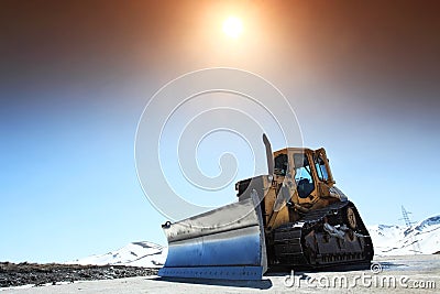 Snow-cleaning bulldozer Stock Photo