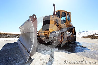Snow-cleaning bulldozer Stock Photo