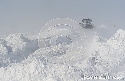 Snow cleaning on the road after a blizzard Stock Photo