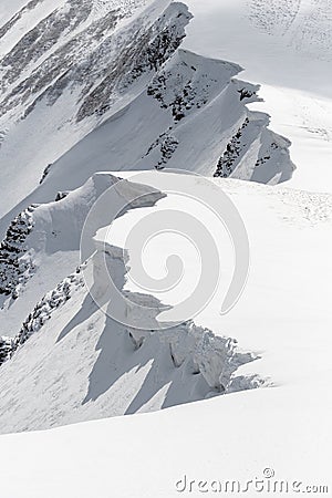 Snow Cornices in the Mountains Stock Photo