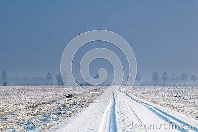 Snow covered countryside road Stock Photo