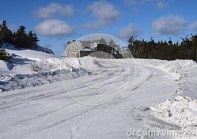 Snow covered curved road Stock Photo