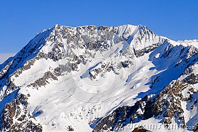 Snow covered French alpine mountains Stock Photo