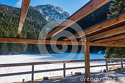 Snow-covered lake with mountains in the background Stock Photo