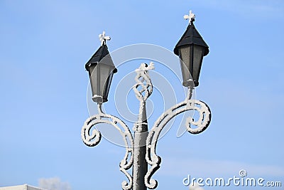 Snow-covered lampposts Stock Photo