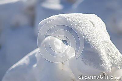 Snow covered landscape in cold winter with frosty and frozen snowbanks show the icy side of winter in January and February as tour Stock Photo