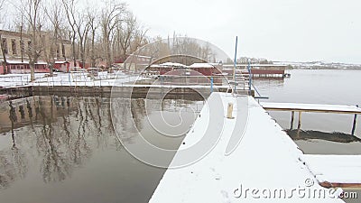 Snow covered marina. Snow-covered marina in the park on the banks of the Dnieper in the vicinity of the Pridneprovsk park stock footage Snow covered marina. Snow-covered marina in the park on the banks of the Dnieper in the vicinity of the Pridneprovsk park stock footage