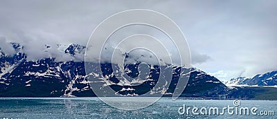 Snow covered mountain in Aalaska and frozen water Stock Photo