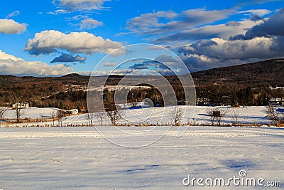 Snow covered mountains and village in Brunswick NY Stock Photo
