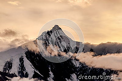 Snow covered peak of Kawagarbo or Kawa Karpo Stock Photo