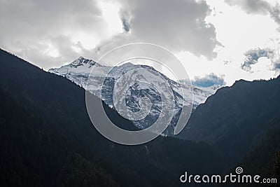Snow-covered peak trekking Annapurna circuit Stock Photo