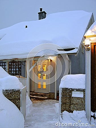 Snow-covered winterly house entrance Stock Photo