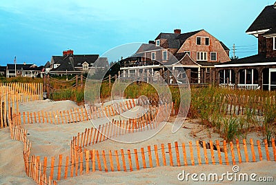 A snow fence protects the dunes Stock Photo