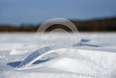 Snow figure from the wind on the plain Stock Photo