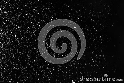 Snow flakes falling on black background. Stock Photo