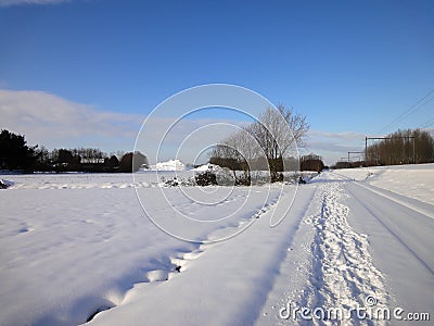 Snow landscape with blue sky Stock Photo