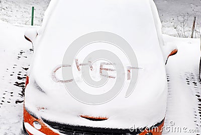 Snow letters written on car Stock Photo