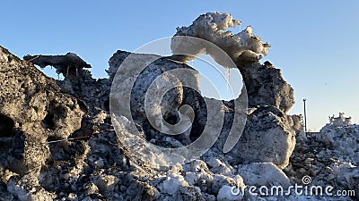 snow with lots of dirt with stand formed cirlces Stock Photo