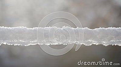 Snow lying on the wires Stock Photo