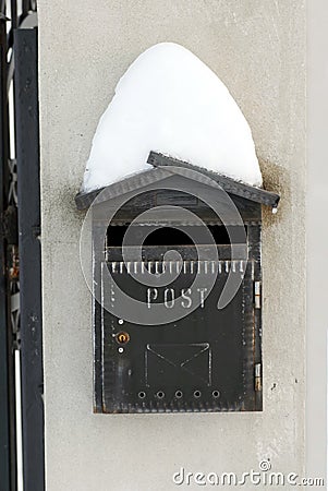 Snow on mail post box Stock Photo