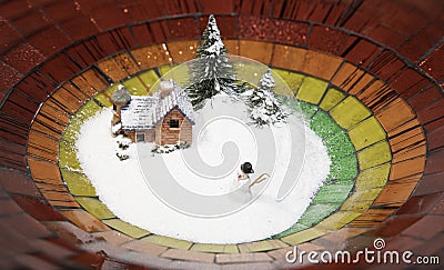 Snow man with snow cover house and Christmas tree in colorful plate Stock Photo