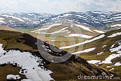 Snow melted on top of the mountains Editorial Stock Photo