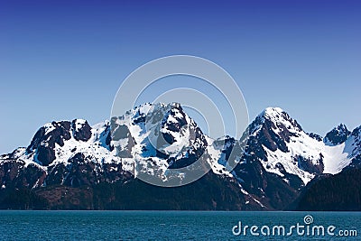 Snow melting on mountains Stock Photo