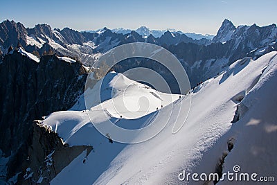Snow Mountain Climbers Stock Photo