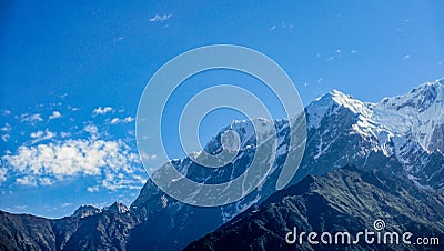 Snow mountains with blue sky Stock Photo