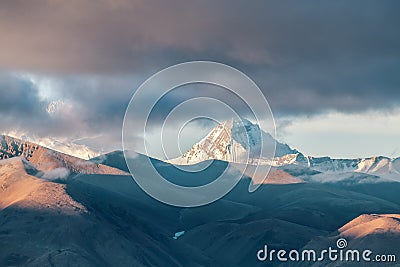 Snow mountains and clouds in Shigatse city Tibet Autonomous Region, China Stock Photo