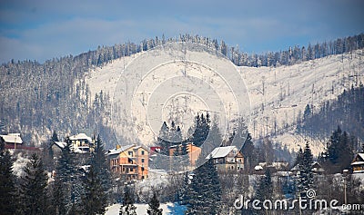 Snow nature resort Mountain houses in the mountains in winter Stock Photo
