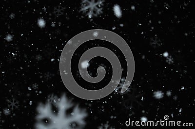 Snow on night sky Stock Photo