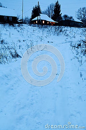 Snow pathway in country village Stock Photo