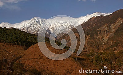 Snow peaked himalayas and deforestation India Stock Photo