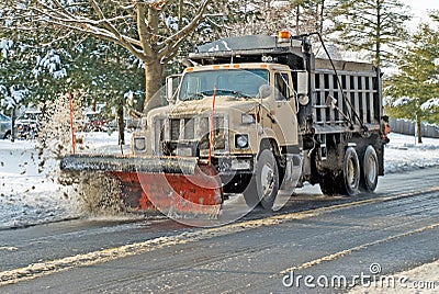 Snow Plow in Action Stock Photo