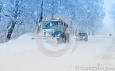 Snow plow doing snow Stock Photo